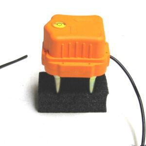 A 3-COMPONENT LAND CASE FOR 4.5HZ ORANGE with a wire attached to it.