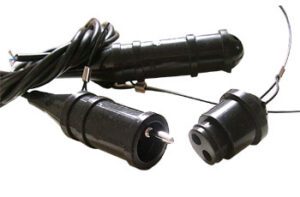 A pair of black KCL FEMALE Connectors and a black plug.