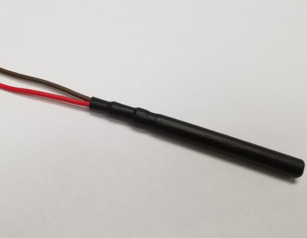 A black and red wire on a white surface. The TRIGGER SWITCHES.