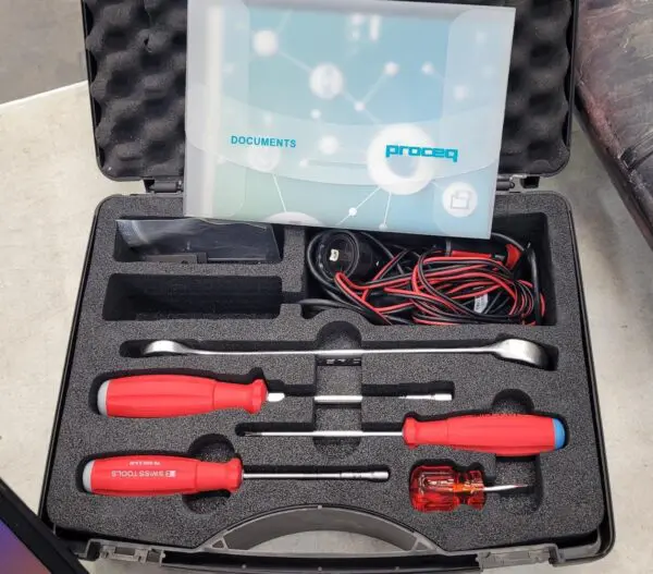 A set of tools in a case with a Screening Eagle Proceq GS800 Subsurface Mapping System.