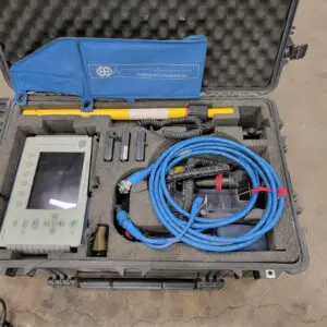 A GSSI SIR-3000 with 1.6Ghz antenna case with a meter and a hose in it.